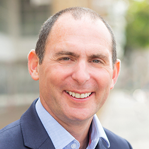 Head shot of Rob Stanton smiling into camera