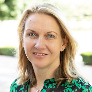 Head shot of Sarah Thompson smiling into camera