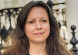 Head shot of Milena Radoycheva smiling and looking away from camera