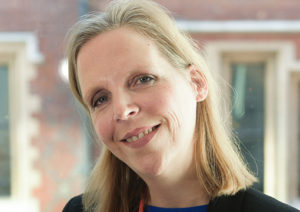 Head shot of Claudia Otto smiling into camera