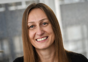 Head shot of Dagmara Selwyn-Kuczera smiling and looking away from camera