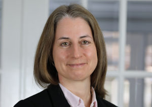 Head shot of Sarah Taylor smiling into camera